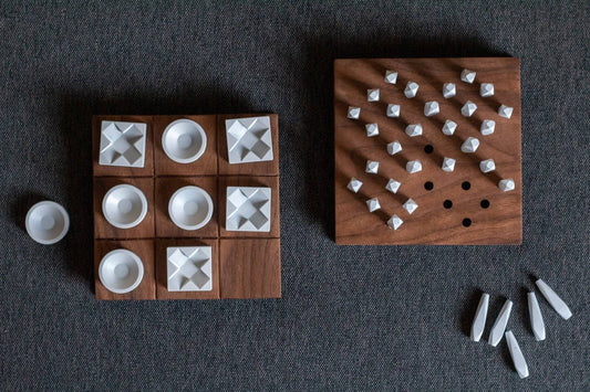 Tic Tac Toe and Peg Solitaire